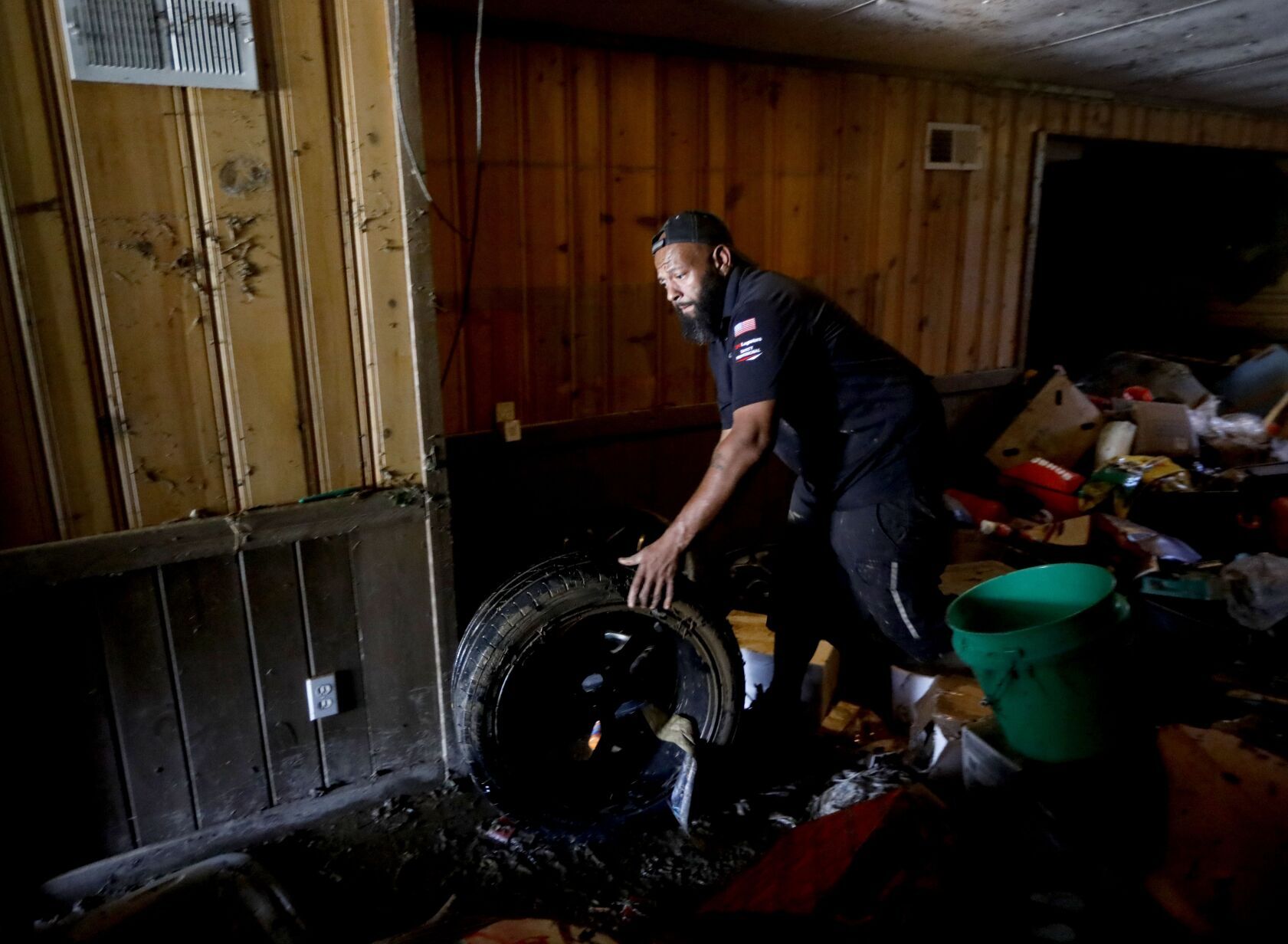 University City residents continue to clean up from flash fooding
